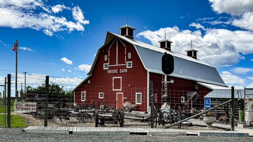 Brooke Barn, a red barn with antiques in the front.
